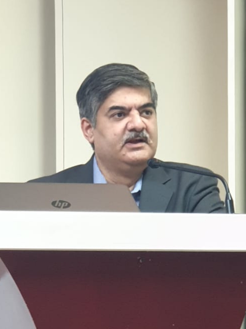 Dr Avinash Dal giving speech at APAH meeting Virinchi Hospitals Hyderabad